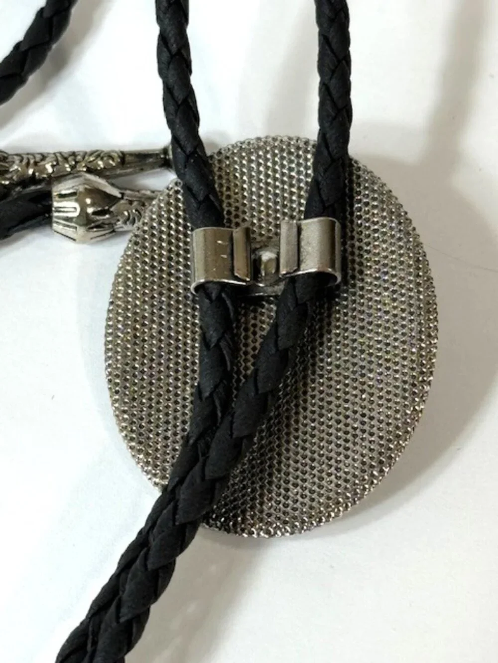 Turquoise-tone, silver-tone and black cord western cowboy bolo tie